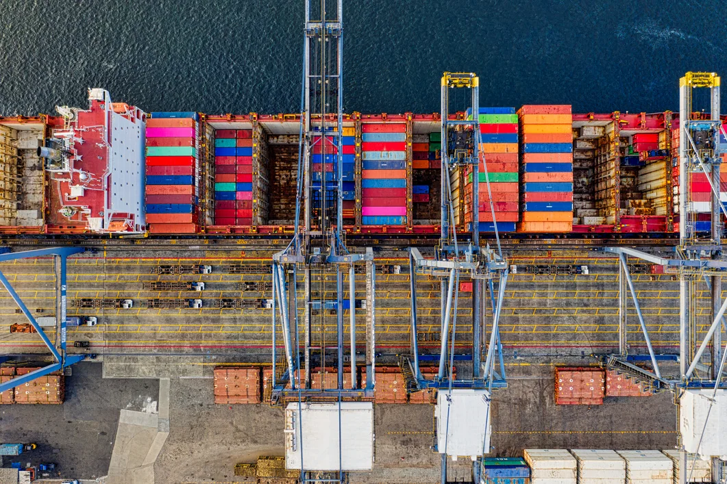 Home Cargo vessels at an international shipping terminal